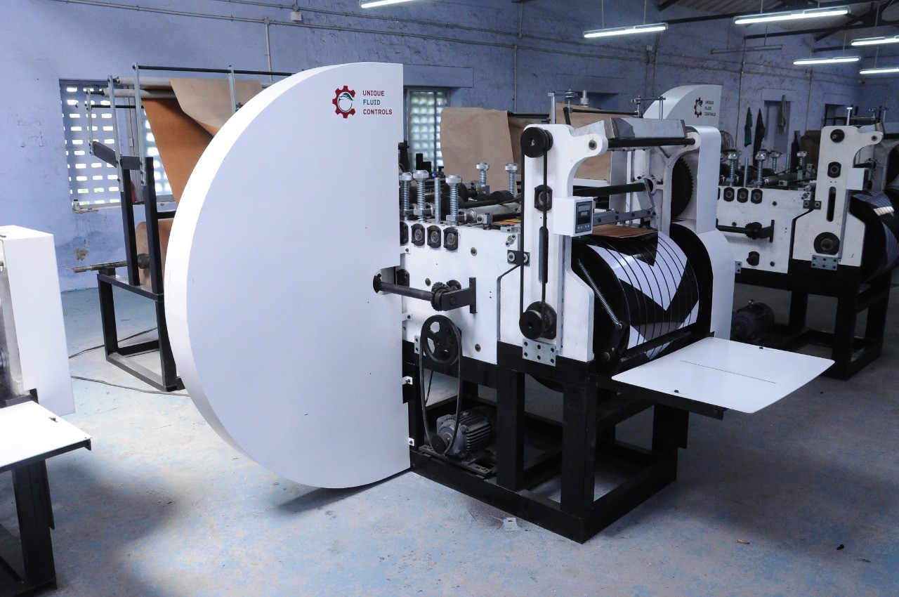 Manufacturers of  paper bag making machine in coimbatore